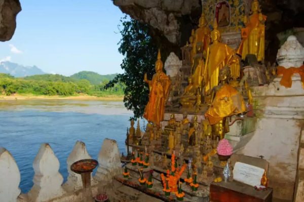 Pak Ou Caves exploration with Laos Tour Packages